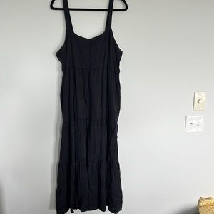The drop black maxi dress. Xxl. NWT. Pockets. Adjustable button straps. Lyocell